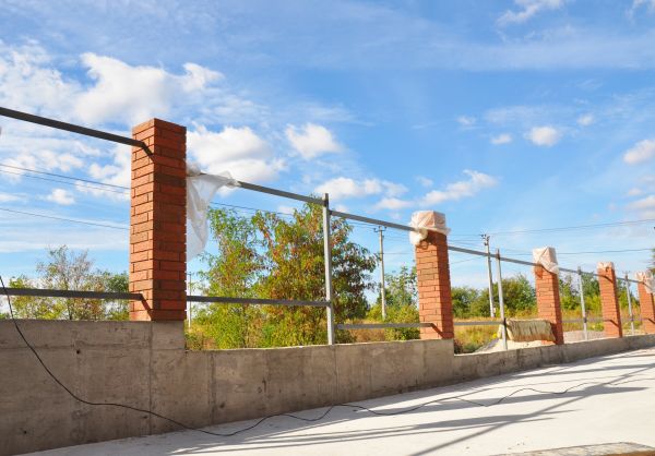 Brick Pillar Installation in Granger